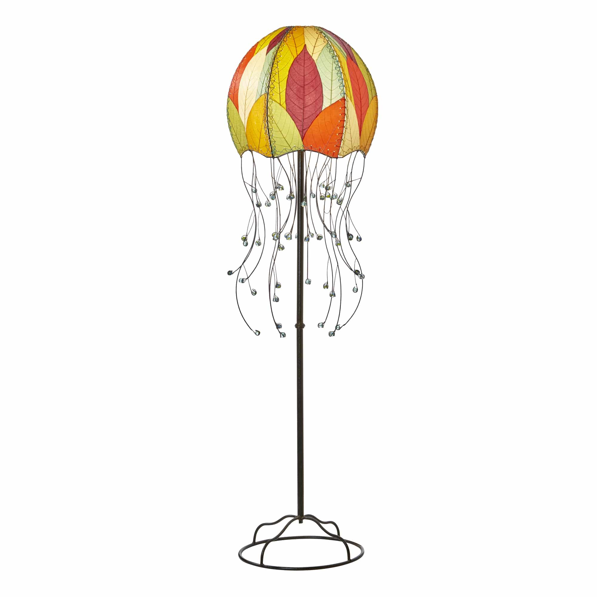 Crafted by the artisans of Eangee Home Design, the Jellyfish Large Floor Lamp in multi color against a clean backdrop, featuring fossilized cocoa leaf shade, wrought iron frame, eco friendly.