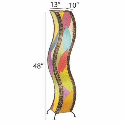 The Eangee Home Design Wave Large Floor Lamp Multi Color, with red, yellow, green, and orange leaf patterns, stands on a light wooden floor in a modern room, its soothing curves adding calm to the decor.