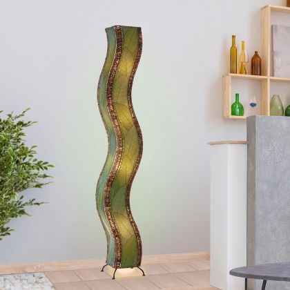 Crafted by the artisans of Eangee Home Design, the Wave Giant Floor Lamp in green against a clean backdrop, featuring fossilized cocoa leaf shade, abaca rope accents, eco friendly, handcrafted.