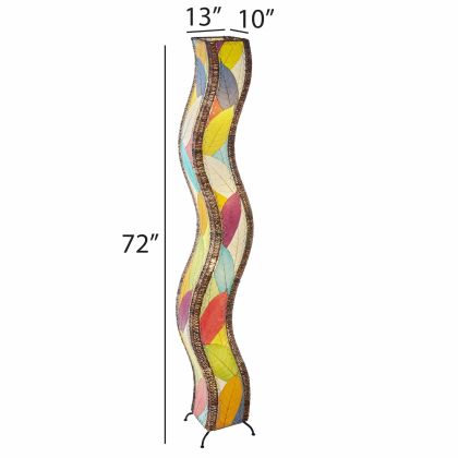 The Eangee Home Design Wave Giant Floor Lamp Multi Color (item #457 xl m) features real cocoa leaves and a vibrant leaf pattern, becoming a calming focal point with its sweeping silhouette in any modern, light-filled living room.