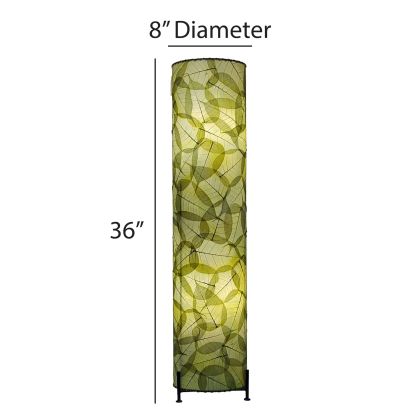 The Banyan Large Floor crafted by the artisans of Eangee Home Design Lamp in green finish by Eangee Home Design displayed against a white background highlights its fossilized cocoa leaf panels, abaca twine accents, wrought iron frame, hand placed natural leaves, and abaca twine stitching, designed to some pieces fill a space.