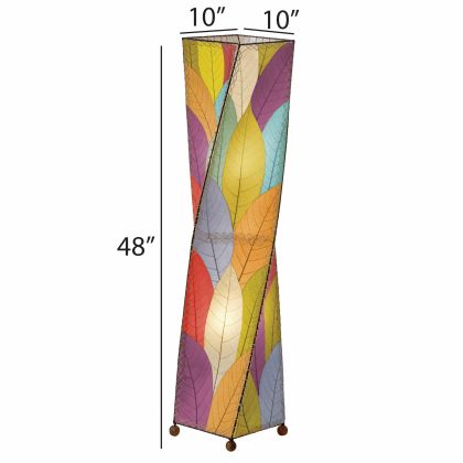 The Twist Large Floor crafted by the artisans of Eangee Home Design Lamp in multi color finish by Eangee Home Design displayed against a white background highlights its fossilized cocoa leaf panels, wrought iron frame, and hand placed natural leaves, designed to the twist giant floor lamp is where design meets poetry.