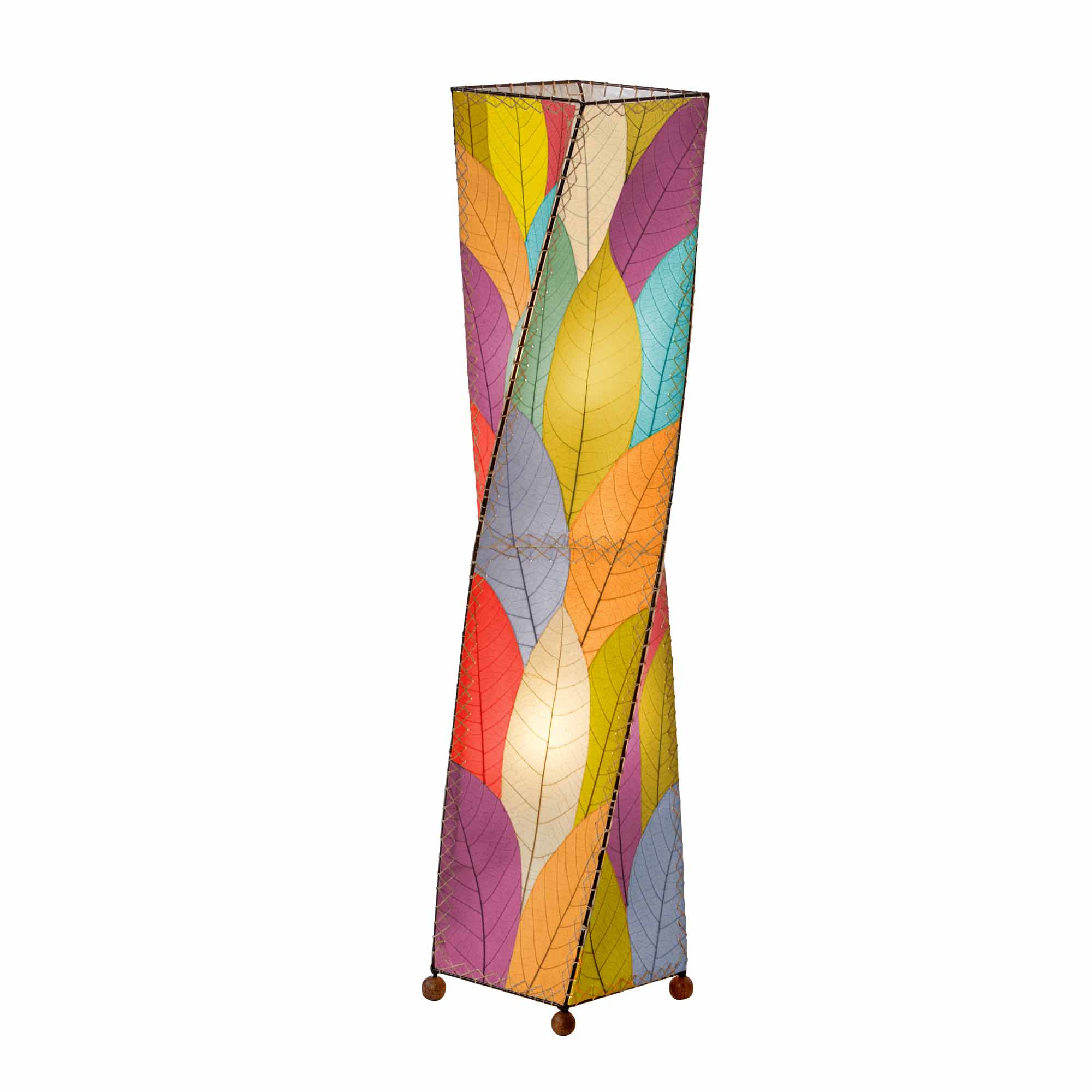 In a sun drenched entryway, crafted by the artisans of Eangee Home Design, the Twist Large Floor Lamp in multi color stands gracefully, featuring fossilized cocoa leaf shade, wrought iron frame, sustainably sourced, handcrafted, adding warmth and character to the space.