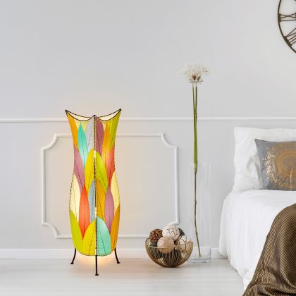 In a sun drenched entryway, crafted by the artisans of Eangee Home Design, the Flowerbud Large Floor Lamp in multi color stands gracefully, featuring fossilized cocoa leaf shade, adding warmth and character to the space.