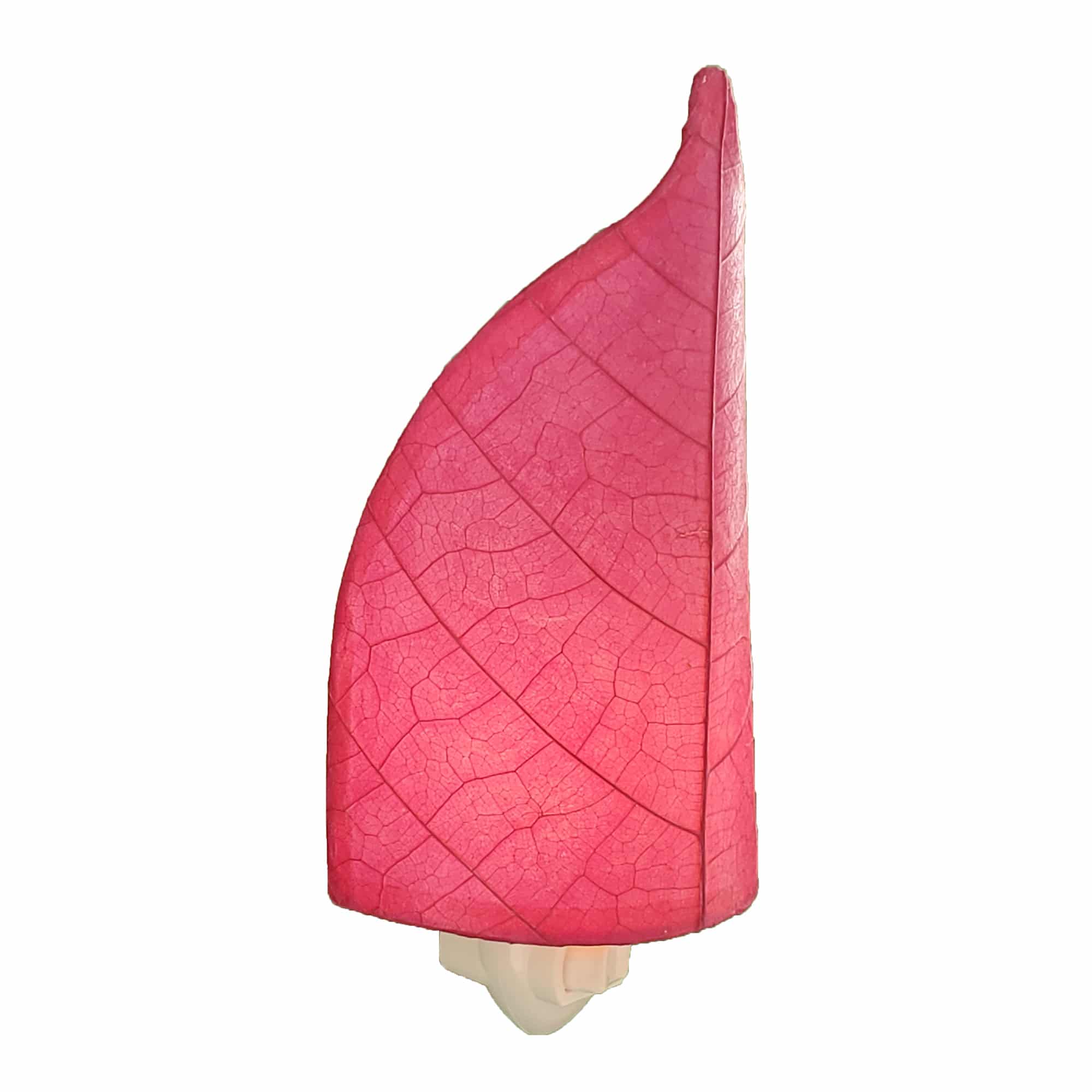 Crafted by the artisans of Eangee Home Design, the Leaf Nightlight in pink against a clean backdrop, featuring fossilized cocoa leaf shade, eco friendly, handcrafted.
