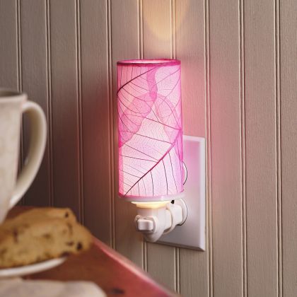 Crafted by the artisans of Eangee Home Design, the Cylinder Nightlight in pink against a clean backdrop, featuring handcrafted detailing, fair trade, eco friendly.