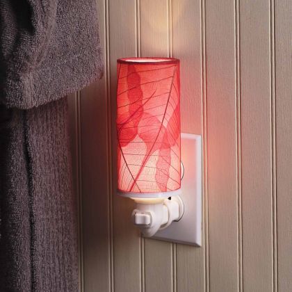 Crafted by the artisans of Eangee Home Design, the Cylinder Nightlight in red against a clean backdrop, featuring handcrafted detailing, fair trade, eco friendly.