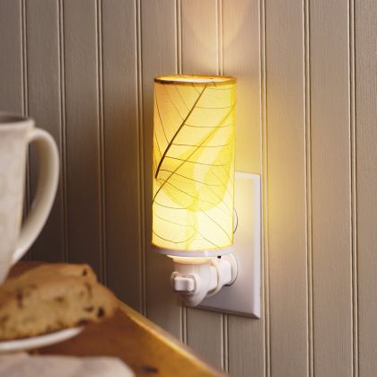 Crafted by the artisans of Eangee Home Design, the Cylinder Nightlight in yellow against a clean backdrop, featuring handcrafted detailing, fair trade, eco friendly.