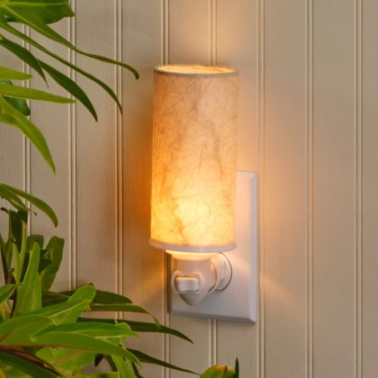 Crafted by the artisans of Eangee Home Design, the Paper Nightlight Wave in natural against a clean backdrop, featuring recycled paper shade, sustainably sourced, handcrafted, recycled materials.