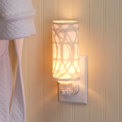 Crafted by the artisans of Eangee Home Design, the Paper Nightlight Arches in natural against a clean backdrop, featuring recycled paper shade, sustainably sourced, handcrafted, recycled materials.