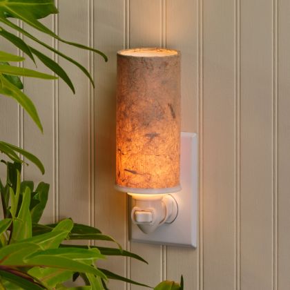 Crafted by the artisans of Eangee Home Design, the Paper Nightlight Banana in natural against a clean backdrop, featuring recycled paper shade, sustainably sourced, handcrafted, recycled materials.