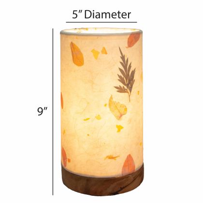 Crafted by the artisans of Eangee Home Design, the Mini Paper Cylinder Table Lamp Fern in natural against a clean backdrop, featuring reclaimed mango wood base, recycled paper shade, sustainably sourced, recycled materials.