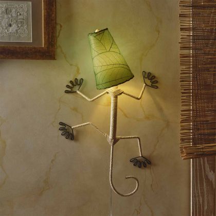 Crafted by the artisans of Eangee Home Design, the Gecko Wall Lamp Combo in green against a clean backdrop, featuring fossilized cocoa leaf shade, abaca rope accents, wrought iron frame, handcrafted.