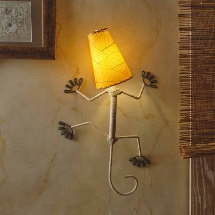 Crafted by the artisans of Eangee Home Design, the Gecko Wall Lamp Combo in orange against a clean backdrop, featuring fossilized cocoa leaf shade, abaca rope accents, wrought iron frame, handcrafted.