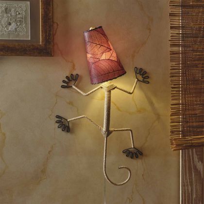Crafted by the artisans of Eangee Home Design, the Gecko Wall Lamp Combo in purple against a clean backdrop, featuring fossilized cocoa leaf shade, abaca rope accents, wrought iron frame, handcrafted.