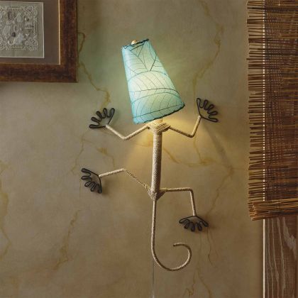 Crafted by the artisans of Eangee Home Design, the Gecko Wall Lamp Combo in sea blue against a clean backdrop, featuring fossilized cocoa leaf shade, abaca rope accents, wrought iron frame, handcrafted.