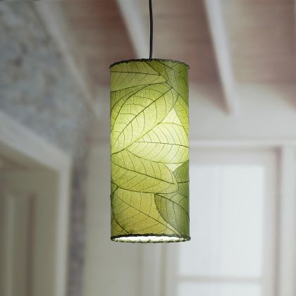 Crafted by the artisans of Eangee Home Design, the Cylinder Pendant in green against a clean backdrop, featuring fossilized cocoa leaf shade, handcrafted.