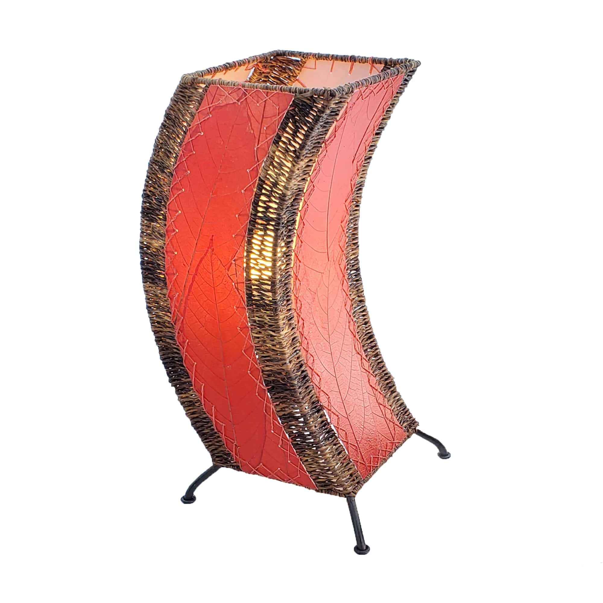 Crafted by the artisans of Eangee Home Design, the C Shape Table Lamp in red against a clean backdrop, featuring fossilized cocoa leaf shade, abaca rope accents, fair trade, handcrafted.