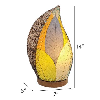 Crafted by the artisans of Eangee Home Design, the Leaflet Table Lamp in multi color against a clean backdrop, featuring fossilized cocoa leaf shade, abaca rope accents, reclaimed mango wood base, wrought iron frame, sustainably sourced.