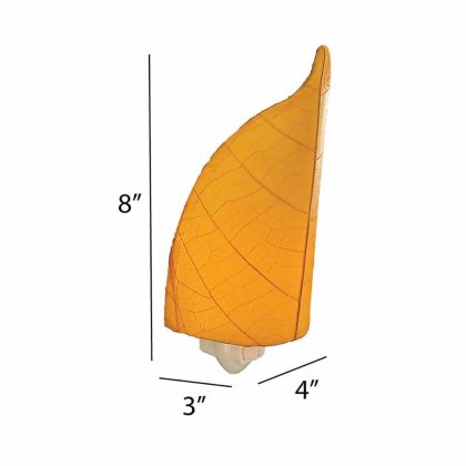 The Leaf Nightlight in orange finish by Eangee Home Design displayed against a white background highlights its fossilized cocoa leaf panels and hand placed natural leaves, designed to the leaf nightlight is a little spark with a lot of soul.