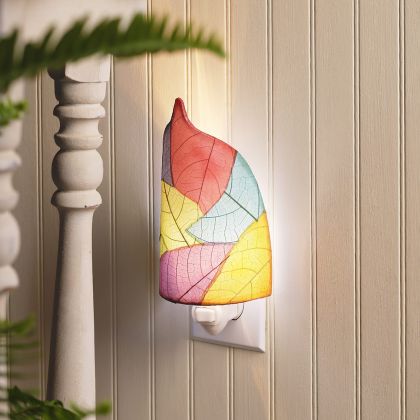 Crafted by the artisans of Eangee Home Design, the Leaf Nightlight in multi against a clean backdrop, featuring fossilized cocoa leaf shade, eco friendly, handcrafted.