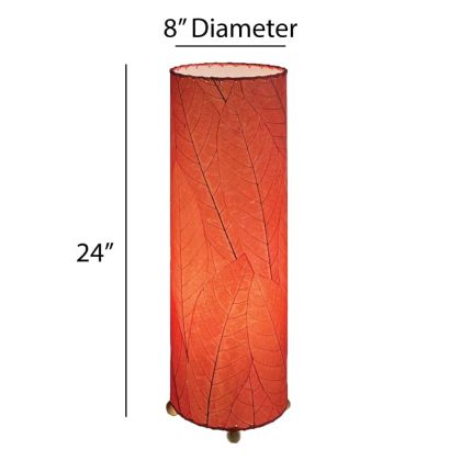 Crafted by the artisans of Eangee Home Design, the 24 Inch Cocoa Leaf Cylinder Table Lamp in red against a clean backdrop, featuring fossilized cocoa leaf shade, fair trade, eco friendly, sustainably sourced, handcrafted.