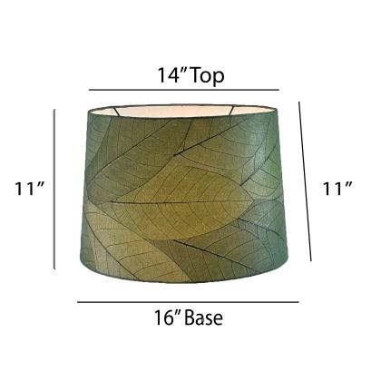 Crafted by the artisans of Eangee Home Design, the 16 Inch Tapered Drum Shade in green against a clean backdrop, featuring fossilized cocoa leaf shade, wrought iron frame, fair trade, sustainably sourced, handcrafted.