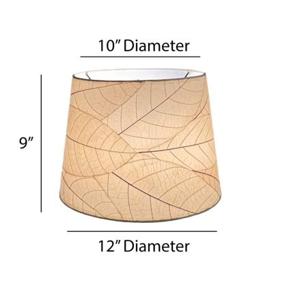 Crafted by the artisans of Eangee Home Design, the 12 Inch Tapered Drum Shade in natural against a clean backdrop, featuring fossilized cocoa leaf shade, fair trade.