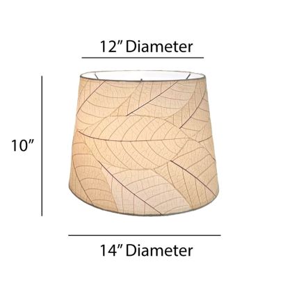 Crafted by the artisans of Eangee Home Design, the 14 Inch Tapered Drum Shade in natural against a clean backdrop, featuring fossilized cocoa leaf shade, wrought iron frame, fair trade, eco friendly, sustainably sourced, handcrafted.