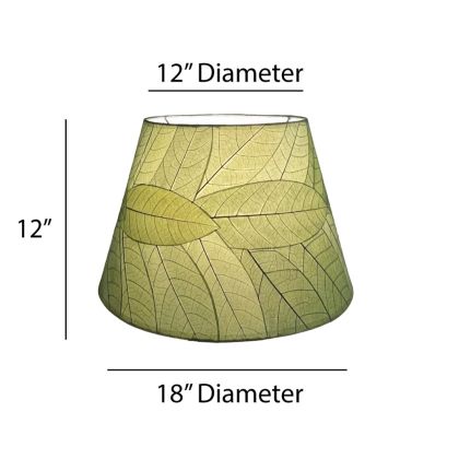 Crafted by the artisans of Eangee Home Design, the 18 Inch British Empire Shade in green against a clean backdrop, featuring fossilized cocoa leaf shade, wrought iron frame, eco friendly, sustainably sourced.