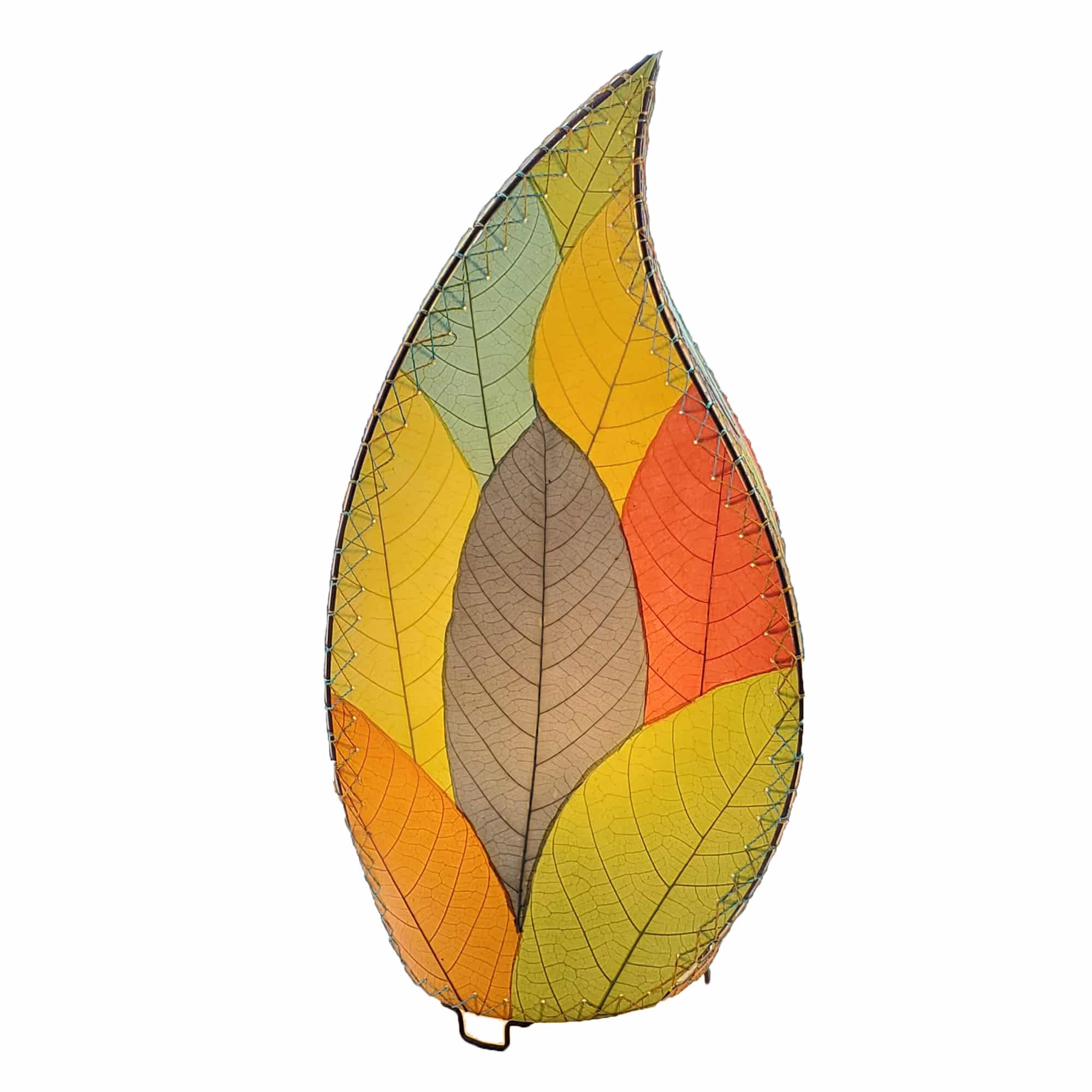 In a quiet bedside corner, crafted by the artisans of Eangee Home Design, the 24 Inch Leaflet Lamp in multi color stands gracefully, featuring fossilized cocoa leaf shade, abaca rope accents, wrought iron frame, handcrafted, adding warmth and character to the space.