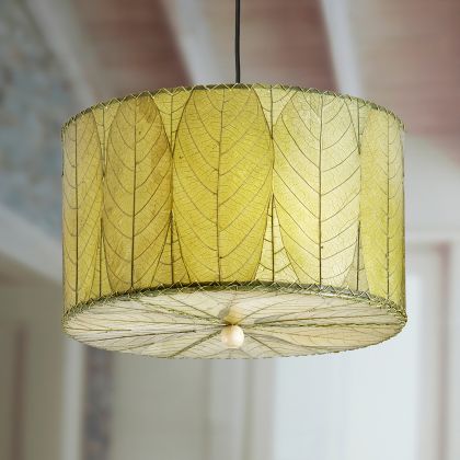 Crafted by the artisans of Eangee Home Design, the Drum Pendant 18 Inch in green against a clean backdrop, featuring fossilized cocoa leaf shade.