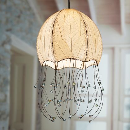 Crafted by the artisans of Eangee Home Design, the Jellyfish Pendant in natural against a clean backdrop, featuring fossilized cocoa leaf shade, wrought iron frame, handcrafted.