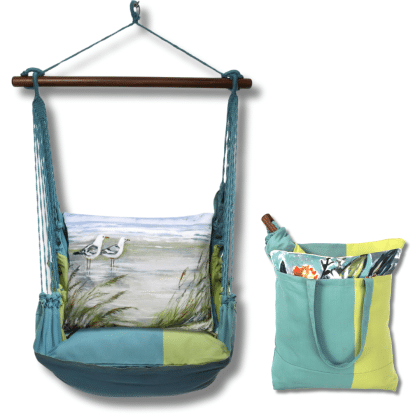 Multi colored outdoor swing crafted by the artisans of Magnolia Casual called the Swing Set 4 piece Meadow Mist Stripe w/ Seagulls featuring 100 percent weather resistant fabric, weather resistant polyester fabric, handcrafted, natural materials shown against a clean backdrop featuring with a stripe motif.