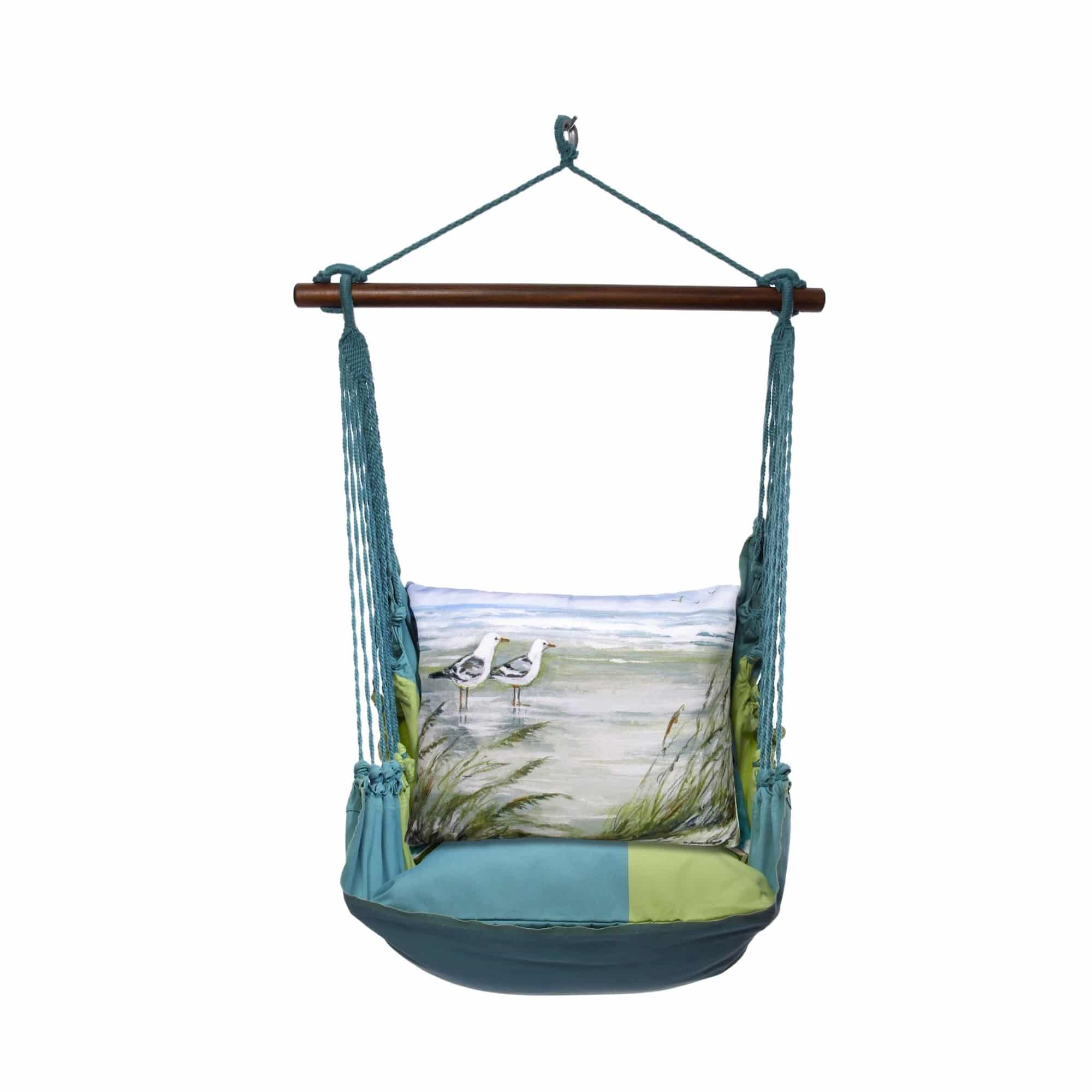 Multi colored outdoor swing crafted by the artisans of Magnolia Casual called the Swing Set 4 piece Meadow Mist Stripe w/ Seagulls featuring 100 percent weather resistant fabric, weather resistant polyester fabric, handcrafted, natural materials shown against a clean backdrop featuring with a stripe motif.