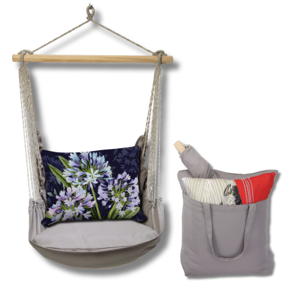 Gray outdoor swing crafted by the artisans of Magnolia Casual called the Swing Set 4 piece Gray Solid w/ Midnight Garden Lilies featuring 100 percent weather resistant fabric, weather resistant polyester fabric, handcrafted shown against a clean backdrop featuring shades of gray.