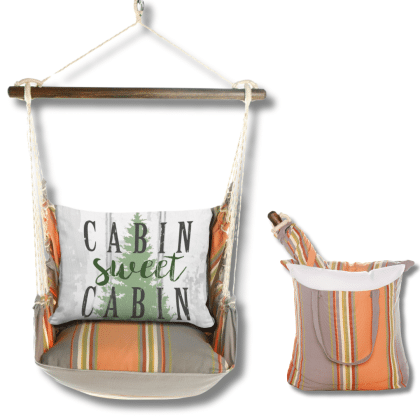 Multi colored outdoor swing crafted by the artisans of Magnolia Casual called the Swing Set 4 piece Serene Sunset w/ Cabin Sweet Cabin featuring 100 percent weather resistant fabric, weather resistant polyester fabric, handcrafted shown against a clean backdrop.