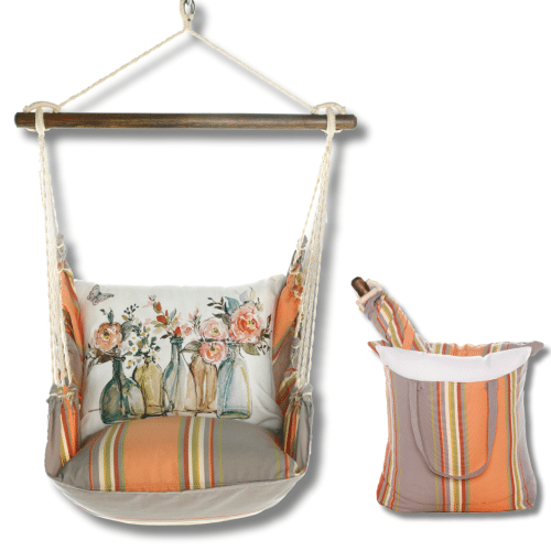Multi colored outdoor swing crafted by the artisans of Magnolia Casual called the Swing Set 4 piece Serene Sunset w/ Flowers in Glass Bottles featuring 100 percent weather resistant fabric, weather resistant polyester fabric, handcrafted shown against a clean backdrop.