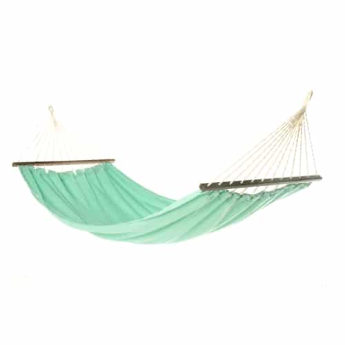 Green outdoor textile crafted by the artisans of Magnolia Casual called the Hammock Seafoam Green Solid featuring 100 percent weather resistant fabric, weather resistant polyester fabric, sustainably sourced, artisan shown against a clean backdrop featuring shades of green.