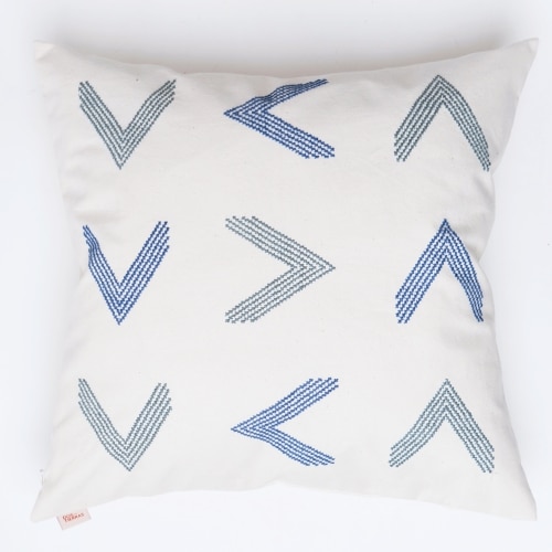 Blue pillow cover crafted by the artisans of Dos Tierras called the Toj Pillow Cover Blue featuring quality outdoor fabric, handcrafted shown against a clean backdrop featuring shades of blue.