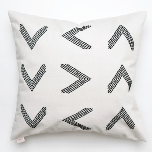 Black pillow cover crafted by the artisans of Dos Tierras called the Toj Pillow Cover Black featuring quality outdoor fabric, handcrafted shown against a clean backdrop featuring shades of black.