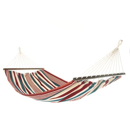 Multi colored outdoor textile crafted by the artisans of Magnolia Casual called the Hammock Stars & Stripes featuring 100 percent weather resistant fabric, weather resistant polyester fabric, sustainably sourced, artisan shown against a clean backdrop featuring with a stripes motif.