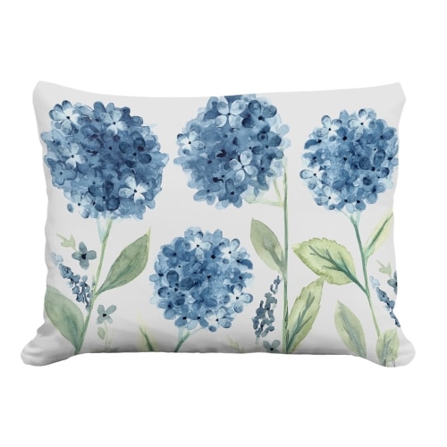 Multi colored outdoor pillow crafted by the artisans of Magnolia Casual called the Outdoor Pillow Four Hydrangeas 19x24 featuring handwoven textile, natural materials shown against a clean backdrop.