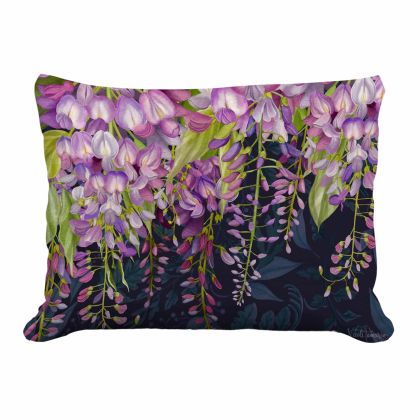 Multi colored outdoor pillow crafted by the artisans of Magnolia Casual called the Outdoor Pillow Midnight Garden Wisteria 19x24 featuring handwoven textile shown against a clean backdrop.