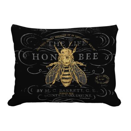 Multi colored outdoor pillow crafted by the artisans of Magnolia Casual called the Outdoor Pillow Vintage Bee 13x18 featuring 100 percent weather resistant fabric, weather resistant polyester fabric shown against a clean backdrop featuring with a bee motif.
