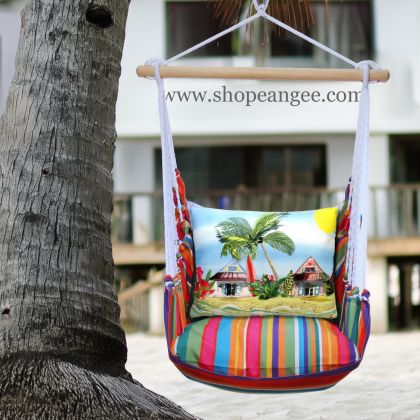 In a cozy garden seating area a multi colored outdoor swing crafted by the artisans of Magnolia Casual called the Swing Set 4 piece Le Jardin Stripe w/ Surf Shack is displayed featuring 100 percent weather resistant fabric, weather resistant polyester fabric, handcrafted adding comfort and style to the space featuring with a stripe motif.