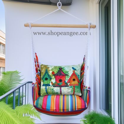 In a cozy garden seating area a multi colored outdoor swing crafted by the artisans of Magnolia Casual called the Swing Set 4 piece Le Jardin Stripe w/ 3 Birdhouses is displayed featuring 100 percent weather resistant fabric, weather resistant polyester fabric, handcrafted adding comfort and style to the space featuring with a stripe motif.