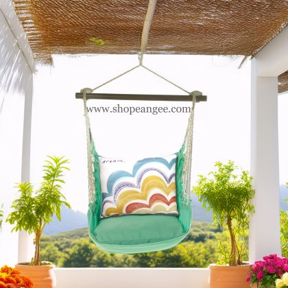 In a sunlit patio lounge a green outdoor swing crafted by the artisans of Magnolia Casual called the Swing Set 4 piece Seafoam Green Solid w/ Dream is displayed featuring 100 percent weather resistant fabric, weather resistant polyester fabric, handcrafted adding comfort and style to the space featuring shades of green.