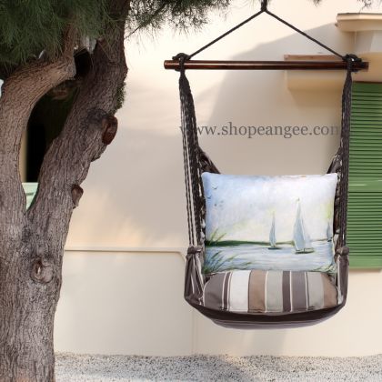 In a sunlit patio lounge a gray outdoor swing crafted by the artisans of Magnolia Casual called the Swing Set 4 piece Slate Gray Stripe w/ Sailboats is displayed featuring 100 percent weather resistant fabric, weather resistant polyester fabric, handcrafted adding comfort and style to the space featuring with a stripe motif and shades of gray.