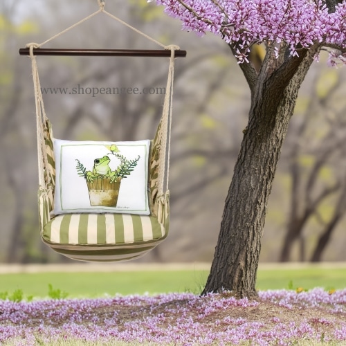 In a sunlit patio lounge a multi colored outdoor swing crafted by the artisans of Magnolia Casual called the Swing Set 4 piece Summer Palms Stripe w/ Frog in Pot is displayed featuring 100 percent weather resistant fabric, weather resistant polyester fabric, handcrafted adding comfort and style to the space featuring with a stripe motif.